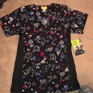 New with tags scrub top XS never been worn!!!